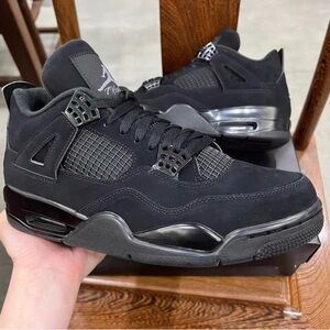 Black cat air Jordan 4 retro.